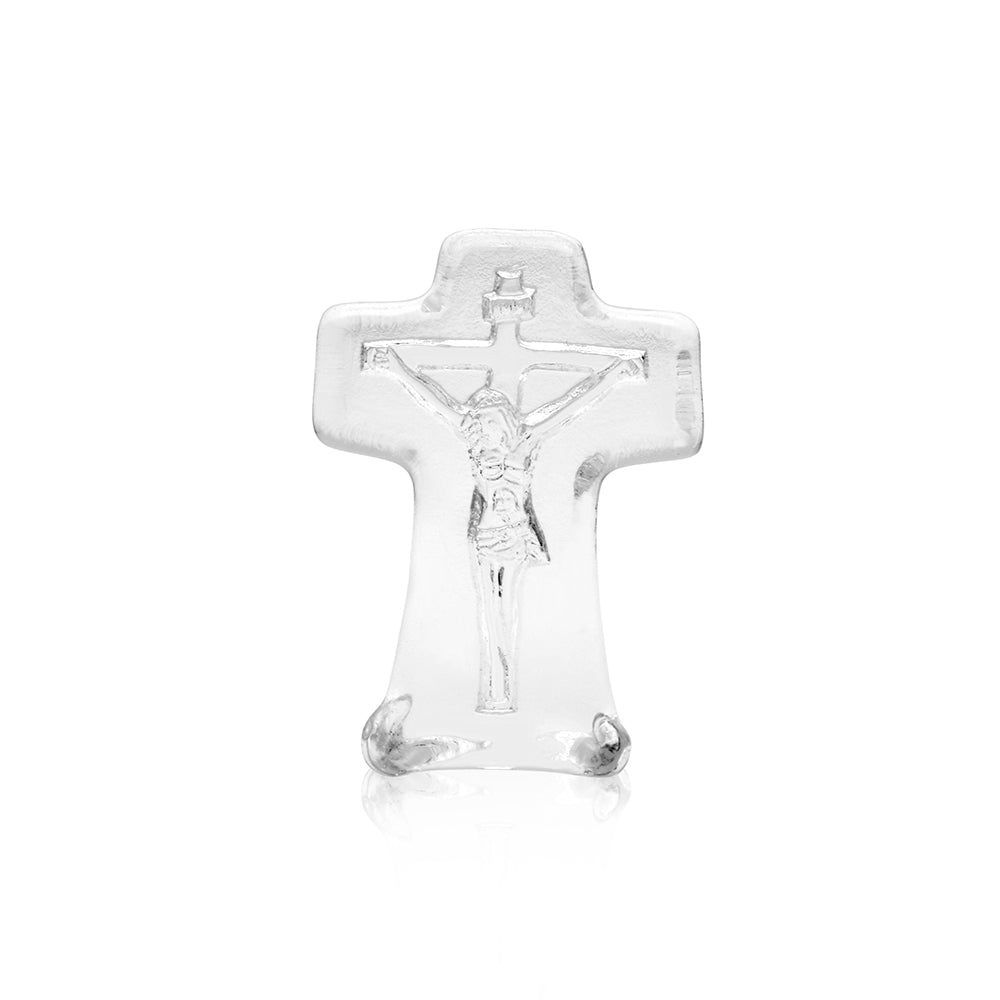 Clear crucifix on a white background