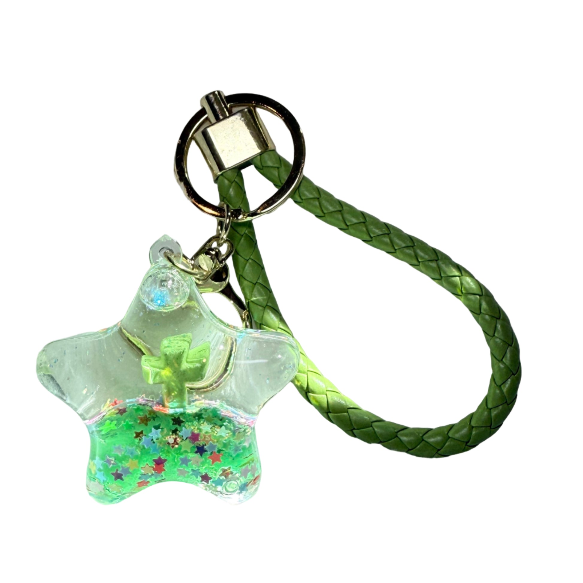 Green braided keychain with a glowing green charm Floating cross